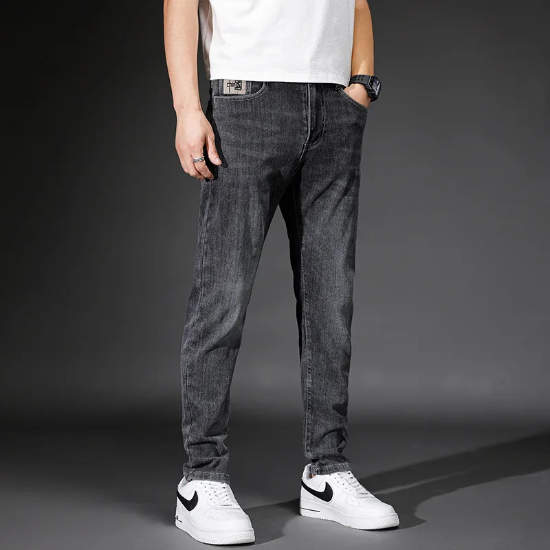 

Новинка 2023, мужские джинсы, модные брендовые облегающие мужские брюки с маленькими лапами, Корейская версия модных мужских эластичных брюк