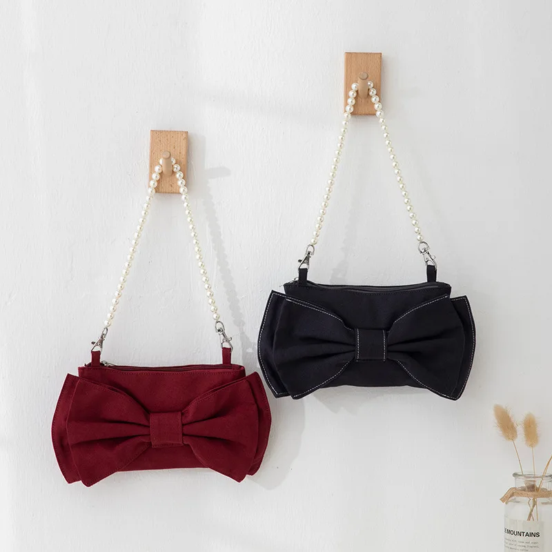 

Fashion Cute Solid Color Bow Design Pearl Chain Shoulder Handbag Baguette Dating Party Makeup Mobile Phone Coin Purse For Women