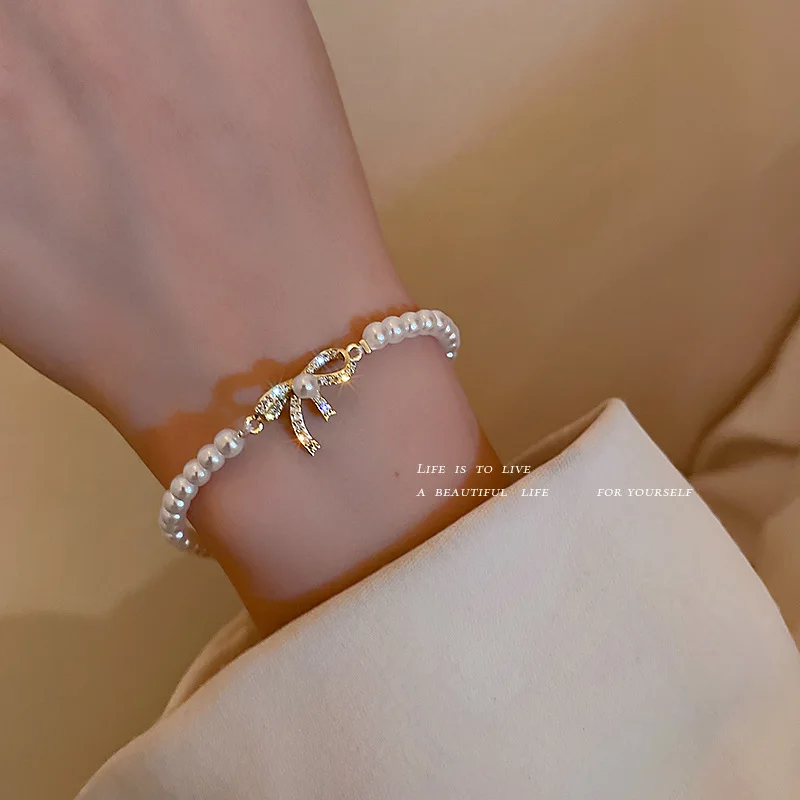 

Classic Baroque Pearl Rhinestone Bracelet for Women Classic Kawaii Diamond Gold Bow Charm Bracelet for Female Jewelry Gift