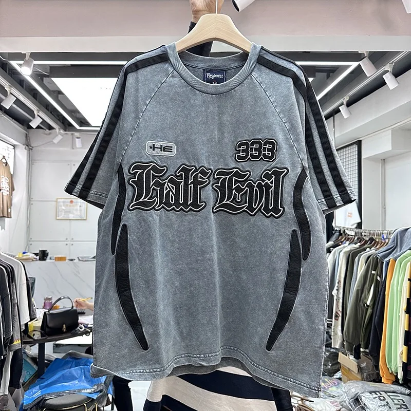 

Heavily embossed embroidered shirt with digital stitching