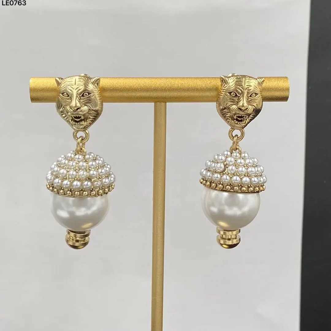 

New Tiger Head Pearl Retro Trendy Earrings