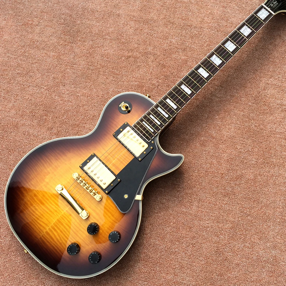 

Электрическая гитара на заказ, фингерборд из палисандра, золотая фурнитура, мост мелодии-о-матизации, топ из твердого красного дерева темного огня и клена