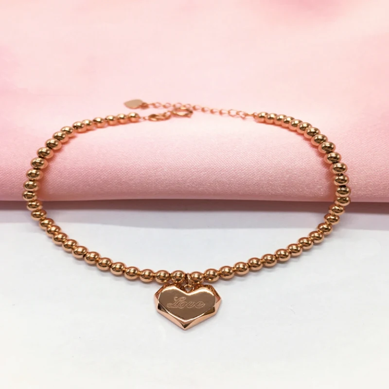 Женский браслет из розового золота 585 пробы с круглыми бусинами