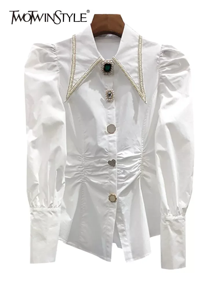 

TWOTWINSTYLE White Patchwork Pearl Shirt For Women Lapel Puff Sleeve Solid Straight Button Through Blouse Female Clothing 2021