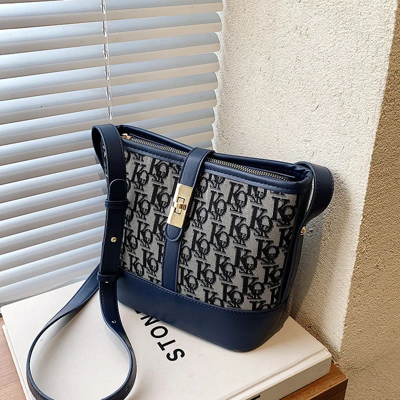 

European and American popular new large-capacity bucket bag design sense stitching letter shoulder bag messenger bag