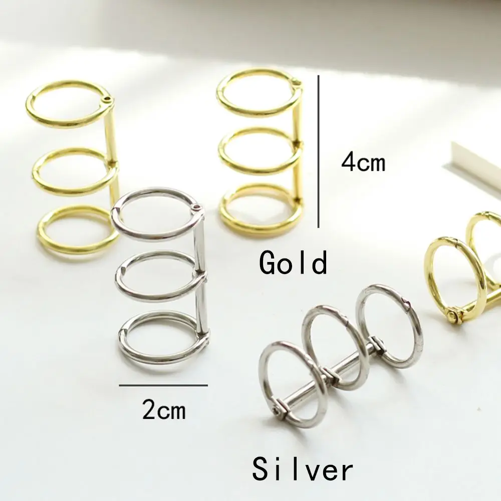 Рисунок 6 - металлические зажимы для альбо