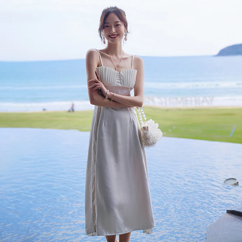 

Женское длинное белое атласное платье-комбинация, лето 2022, подиумное элегантное французское платье на бретелях с открытой спиной, повседневные пляжные вечерние платья