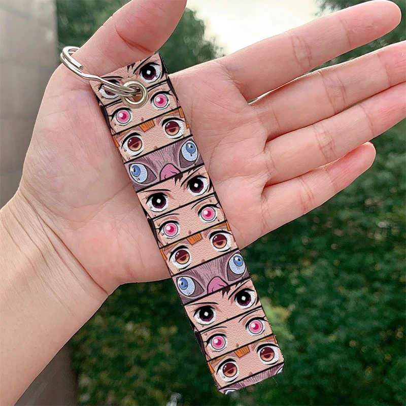 

Japanese Anime Baby Girl Eyes leather motorcycle Key chain Strap Key rings Hanging Holder Bag Wallet Trinket Key chain Hanging