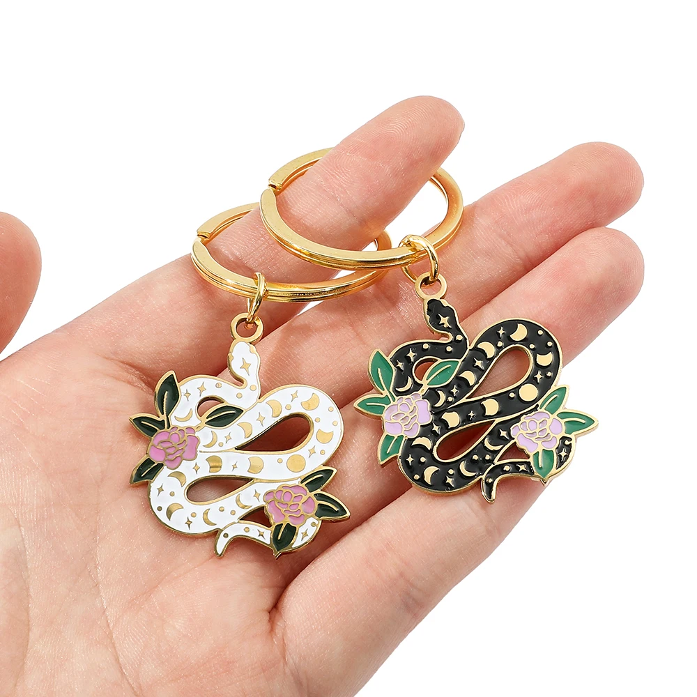 

Модные металлические брелоки в виде змеи черного и белого цветов