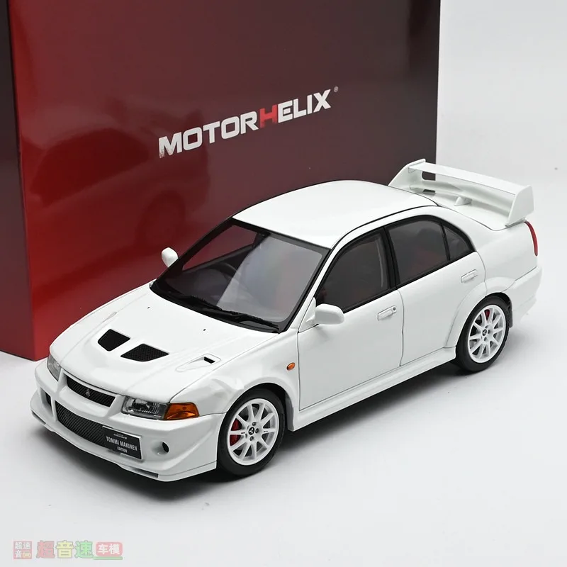 Фото Металлическая модель автомобиля Diecast MotorHelix MH в масштабе 1:18: Mitsubishi Lancer EVO 6.5 №1