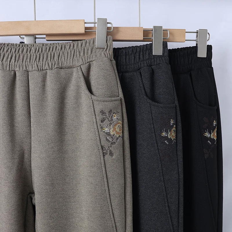 Женские хлопковые брюки с эластичной талией и цветочной вышивкой