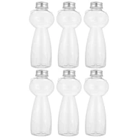 bottles juice bottle drink clear milk empty containers beverage water plastic tea transparent container caps drinking jug