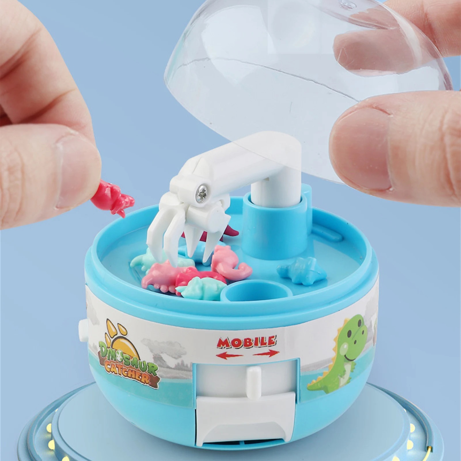 

Capsule Toy Mini Claw Machine Catch Dinosaur Game Cute Catcher Stress Relief Micro Dino Figures Small Prize for Kids Children