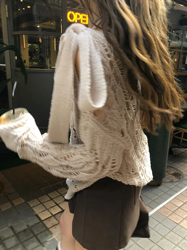 Женский вязаный пуловер оверсайз с вырезом лодочкой в стиле преппи