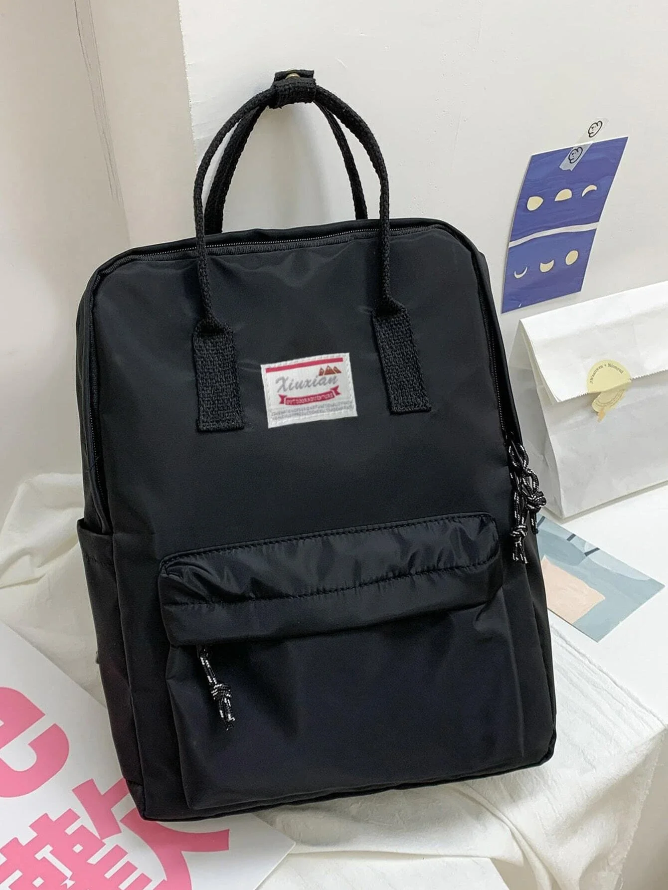 

Large Capacity Pocket Front Backpack