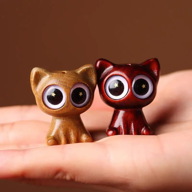 

Деревянная статуэтка кошки