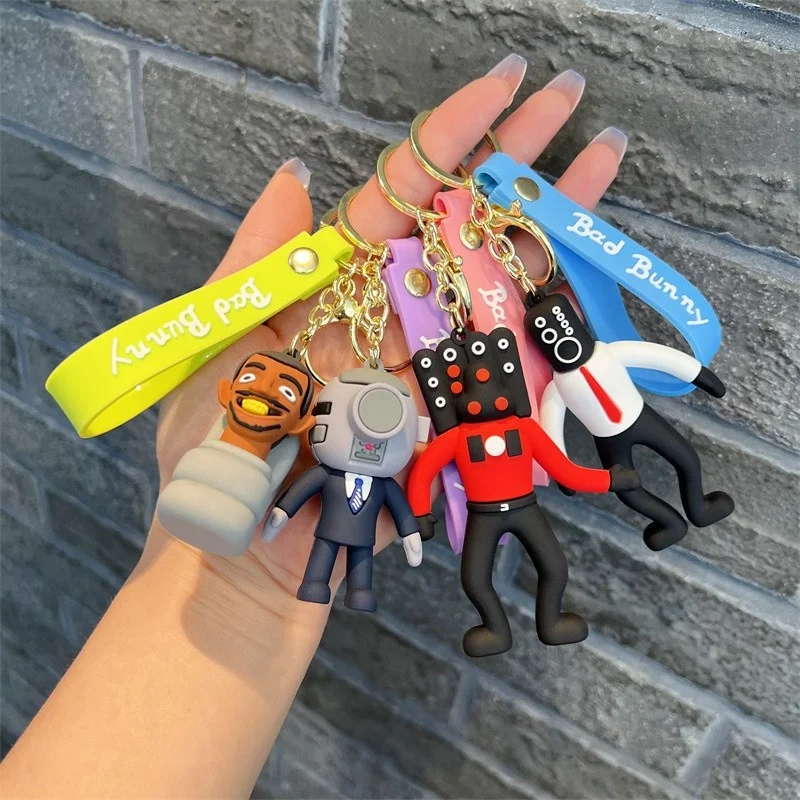 

Skibidi брелок с унитазом Skibidi унитаз, ТВ, мужская камера, фигурка человека, игрушка, ПВХ брелок, подвеска для сумки, брелок, кукла из пластика