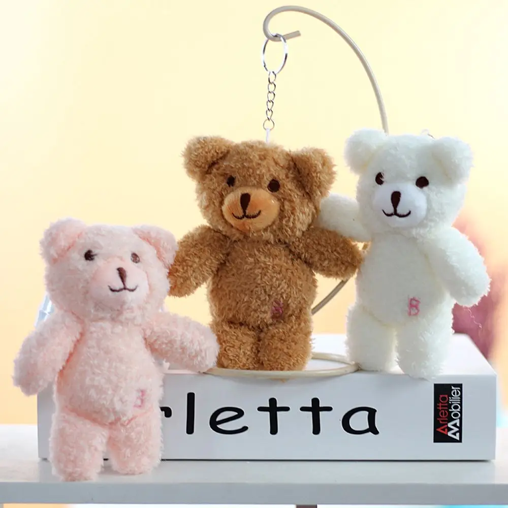 

Cute little white rabbit doll plush toy trumpet bouquet bear pendant bear doll keychain pendant jewelry