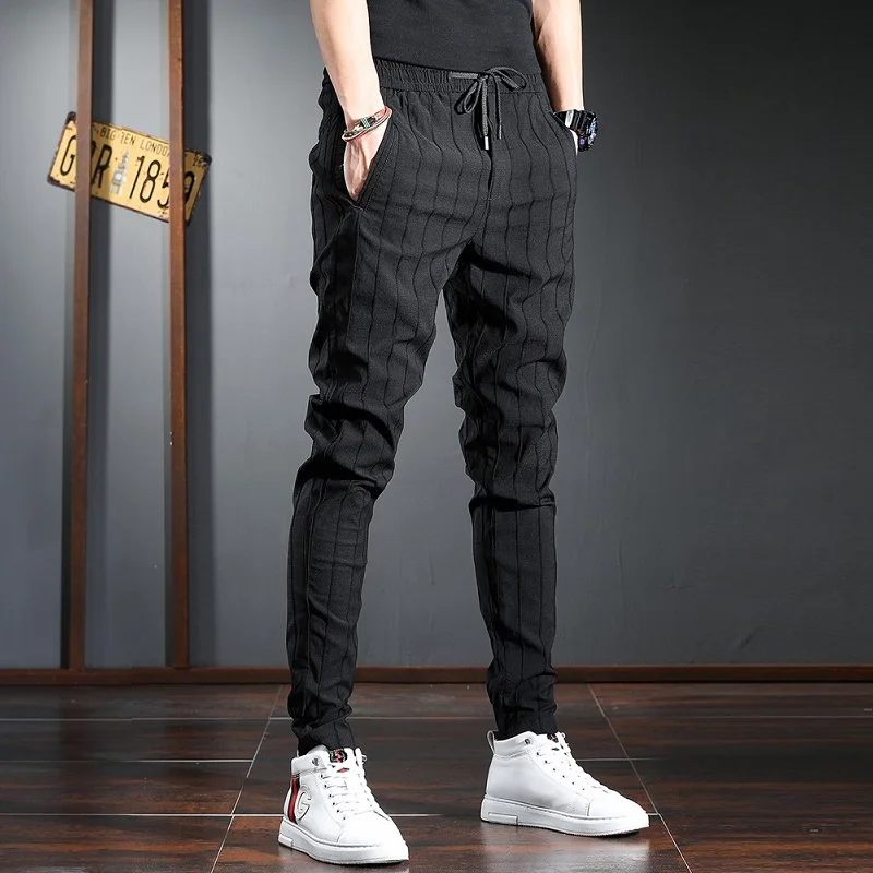 Мужские повседневные брюки Корейская уличная одежда черные Стрейчевые