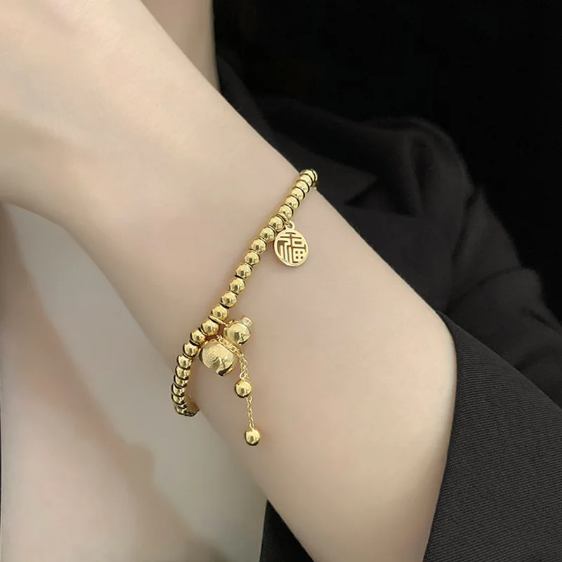 

New Fashion Small Gourd Fu Word Titanium Steel Ball Elastic Rope Bracelet Titanium Steel Gold Plated Retractable Bracelet Female