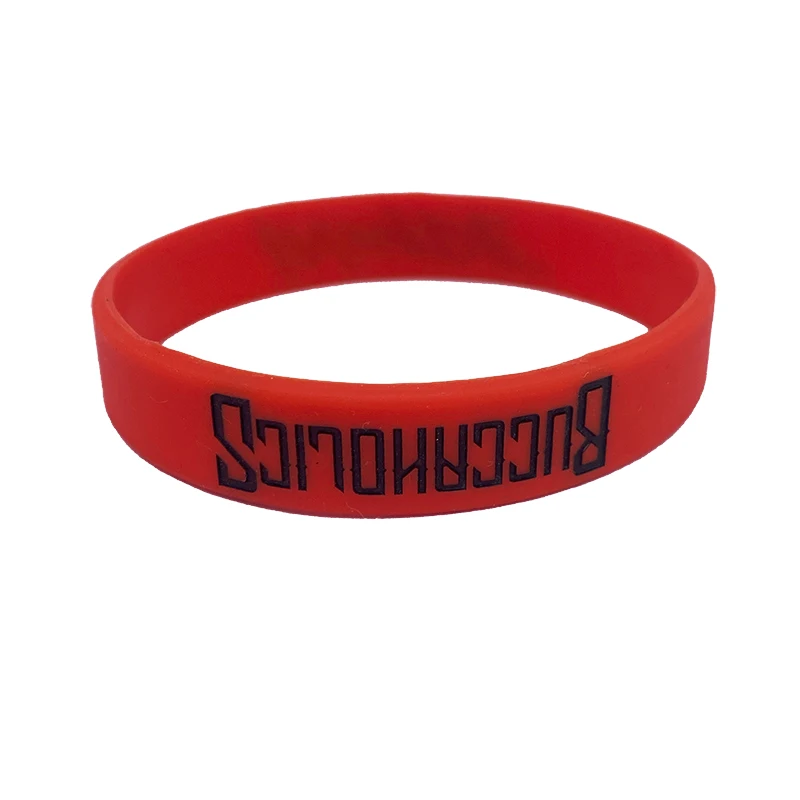 Настраиваемые оранжевые круглые браслеты из ПВХ-силикона с множеством цветов и выдавленным логотипом в большом количестве для клубных спортивных мероприятий.