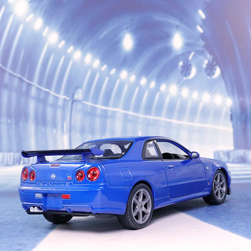 Модель литая автомобиля WELLY 1:24 Nissan Skyline GT-R R34 высокий симулятор игрушечный