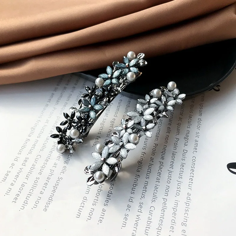 

New Korean version of the retro daisy spring hair clip simple half-tie hair top clip elegant female fashion hair accessories