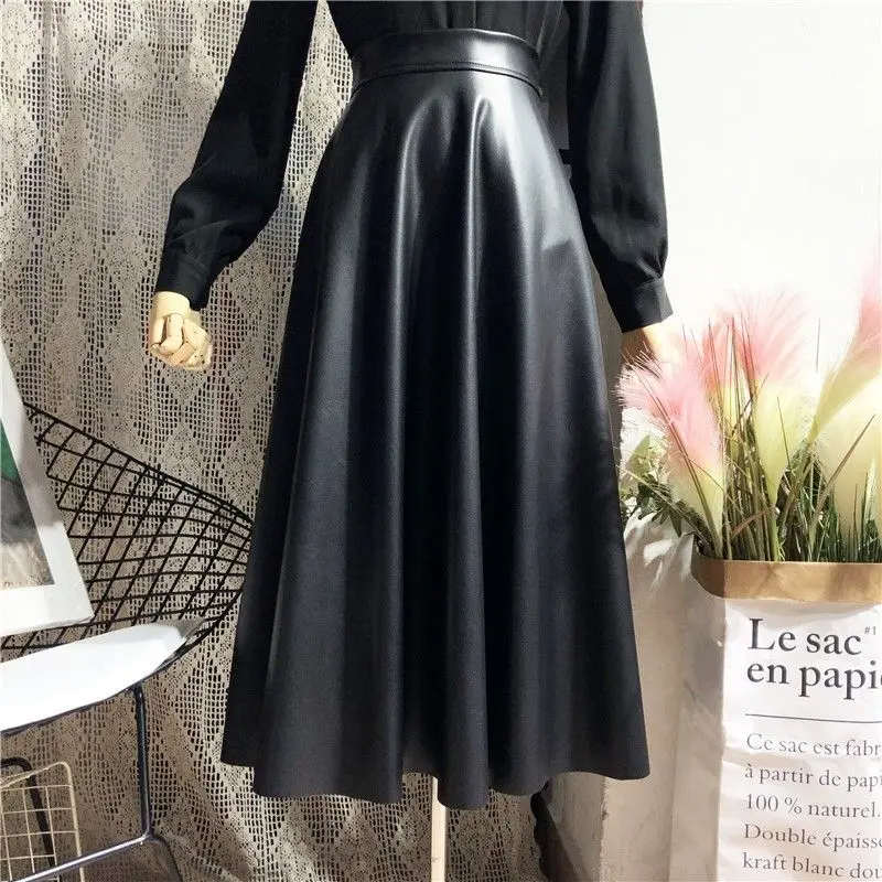 High waist black PU leather skirt women's  autumn and winter  medium long skirt a word across the thin puffy skirt