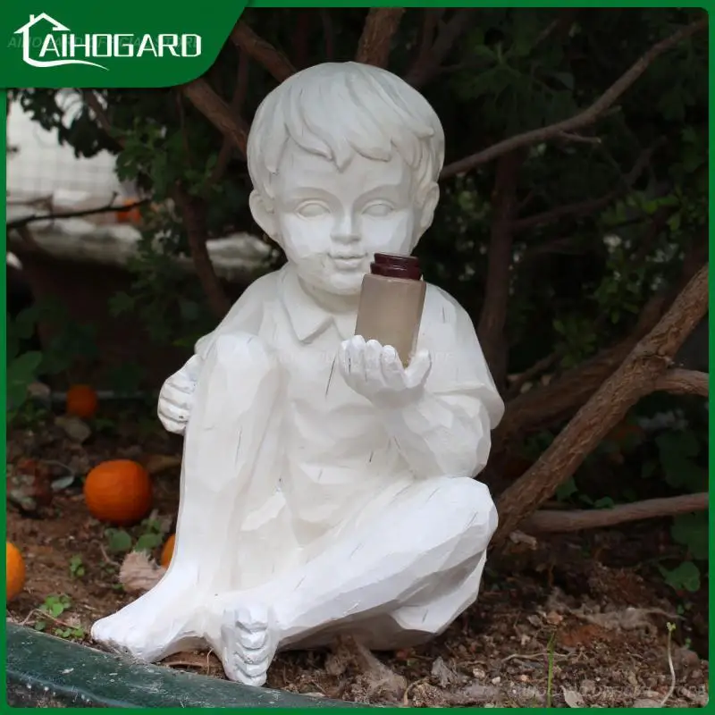 

A Kid with Solar Fireflies Garden Statue Resin Jar Boy Girl Statue Whimsical Flowerbed Yard Outdoor Sculpture Decor Ornaments