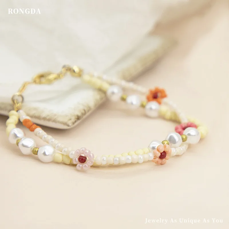 

Summer New Small Fresh Fashion Jewelry Winding Double-layer Small Flower Pearl Bracelet Female Rice Beads Hand-woven Jewelry