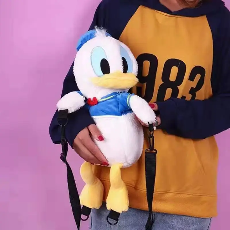 

Disney Cartoons Donald Duck Plush bag Toys Animal Stuffed Toy PP Cotton Dolls Birthday Christmas New Year Presents for Kids gift