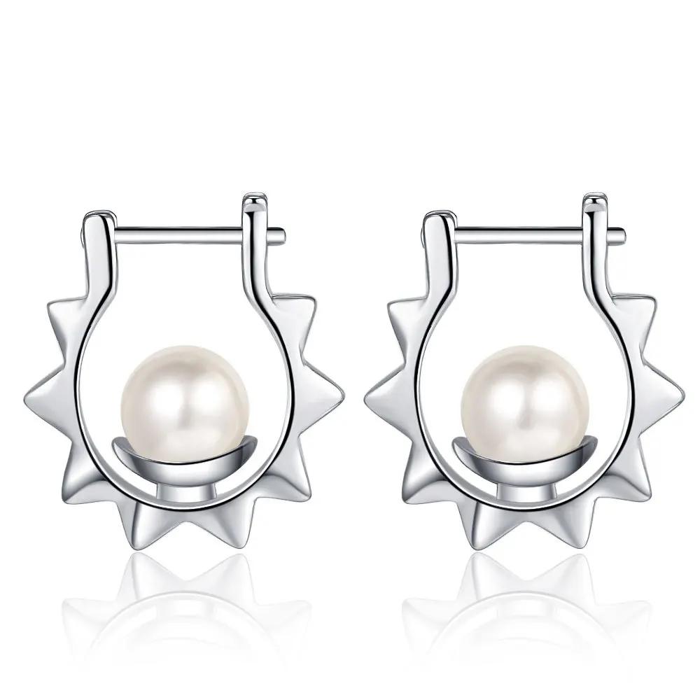 

Женские серьги-кольца в виде солнцезащитных ракушек