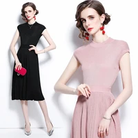 2022 summer new womens high end round neck loose knit sleeveless top fashionable pleated elastic waist skirt two piece set
