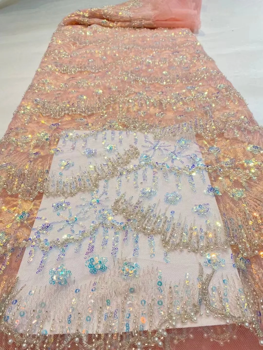 

French Net Lace Fabric 2022 Latest Peach Luxury High-End Beaded Lace Fabric Bridal Crystal Embroidered Tulle Sequins
