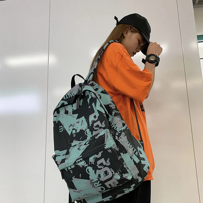 

TRAVEASY Women Graffiti Hip-Pop Men Trend Brand Backpack Nylon New Street Trend Style Cool Bags Female High School Students Lady