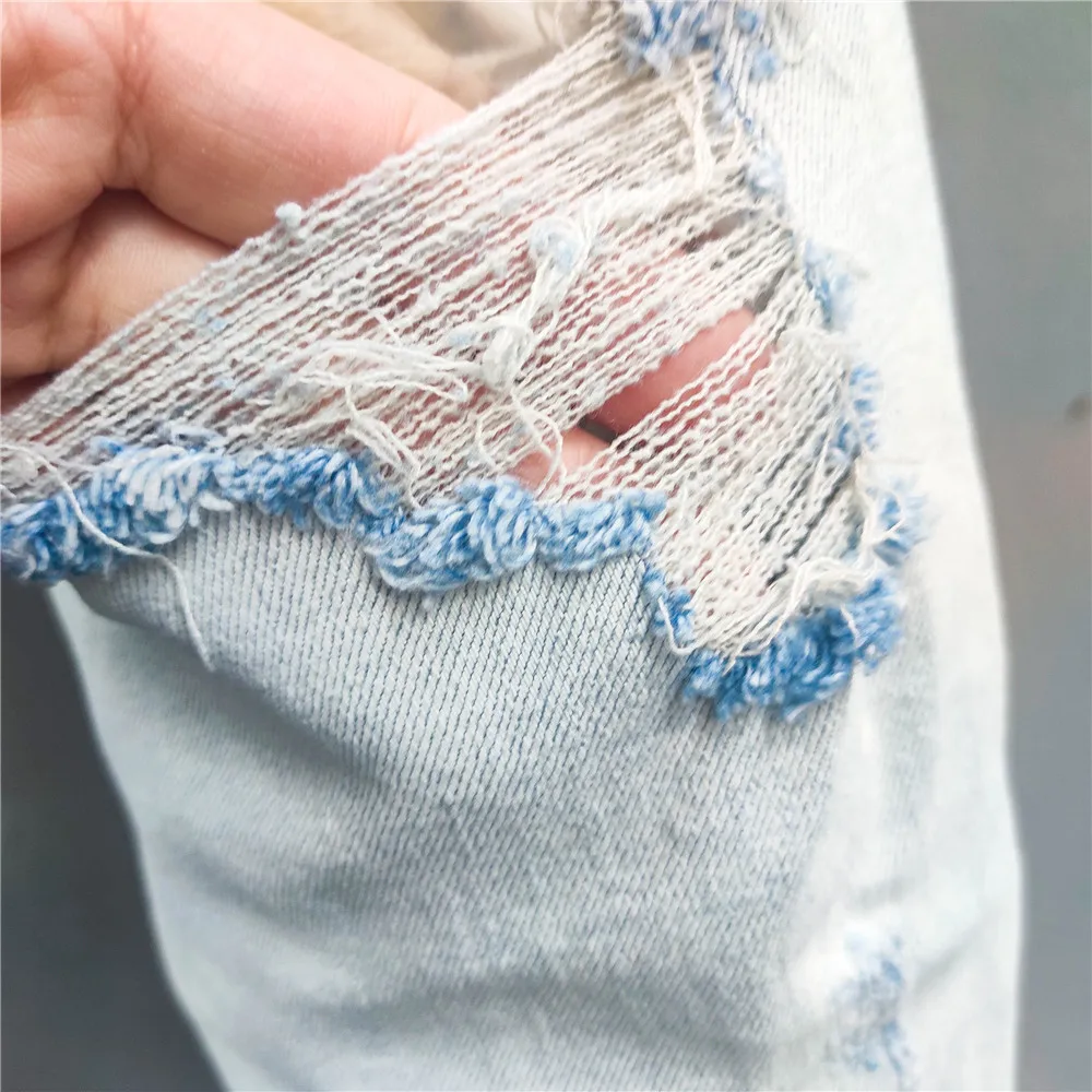 Fashion Designer Hole Slim Fit Jeans Trendy Letter Brand Ripped Jeans Men Stretch Washed Hip Hop Dance Party Jeans Pants Men