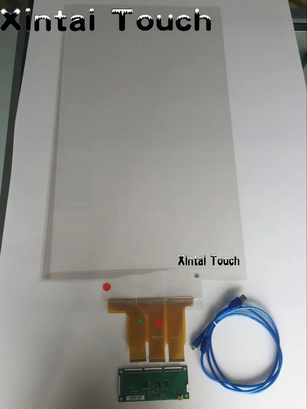 

Xintai Touch Best Price 52 inch 10 points projected capacitive touch screen foil film