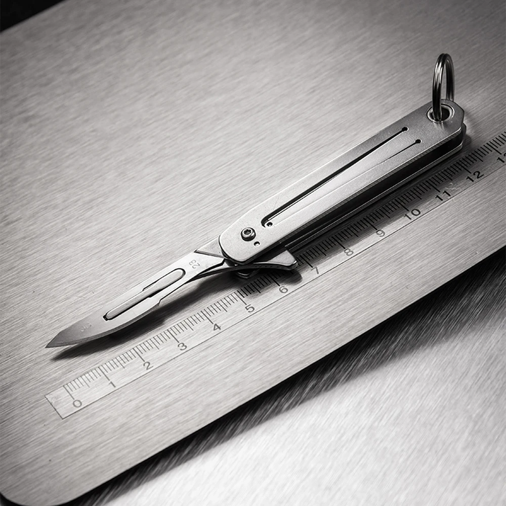 

Stainless Steel Keychain Folding Knife Replaceable Blade Sharp Scalpel Jackknife Survival Pocket Utility Knife EDC Box Cutter