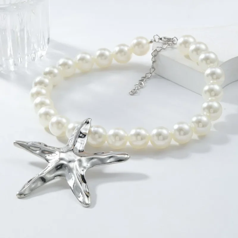 Женские серьги-гвоздики в виде морской звезды