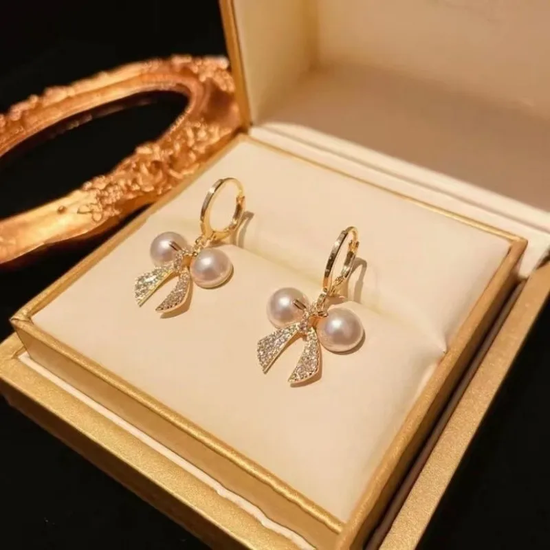 

Korean Version Of The Niche Elegant Temperament Bow Pearl Diamond Ear Buckle Female Fashion Delicate Sweet Simple Earrings