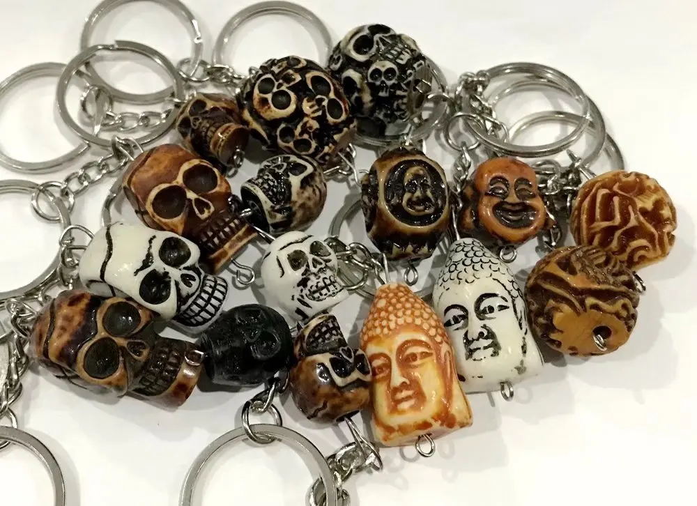

100 PCS Fashion Accessories Terminator Keychain Skull Buddha Personality Keyring