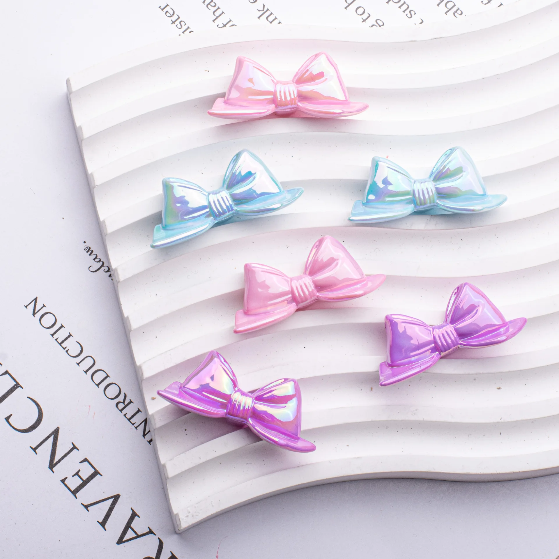 

Wholesale 100pcs 40*17mm AB Spring Pastel Colors Acrylic Ribbon Knot Bow Beads Cute Bubblegum Jewelry Earring Decoration