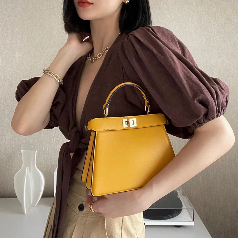 

Famous Luxury Trend Organbag Leisure Single Shoulder Cowhide Handbag Double-sided Lock Simple Diagonal Femalebag Small Squarebag