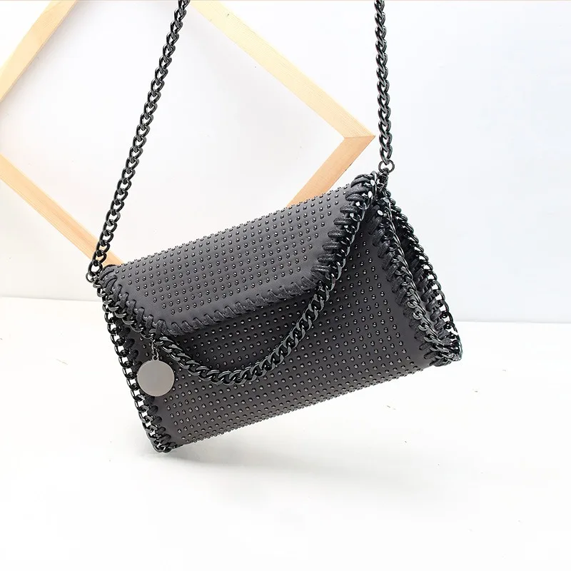 

Free shipping Stella Nina McCartney Fashion Clutch Bag Riveted Women's New Single Shoulder skew straddle Chain Bag