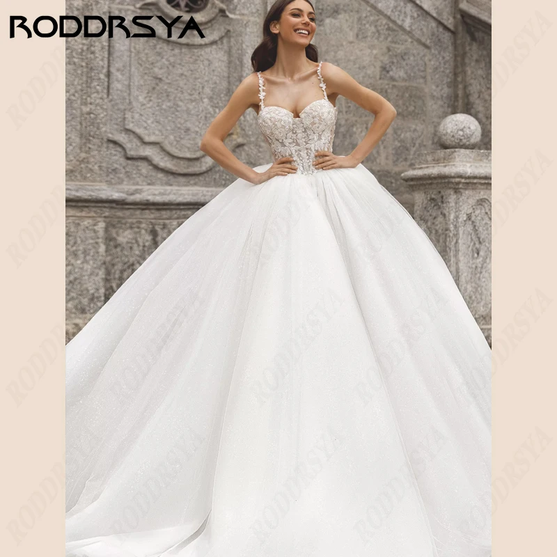 

RODDRSYA Princess Wedding Dress Sweetheart Beach Vestido De Novia Tulle Spaghetti Strap Bridal Gowns Lace Backless Bride Party