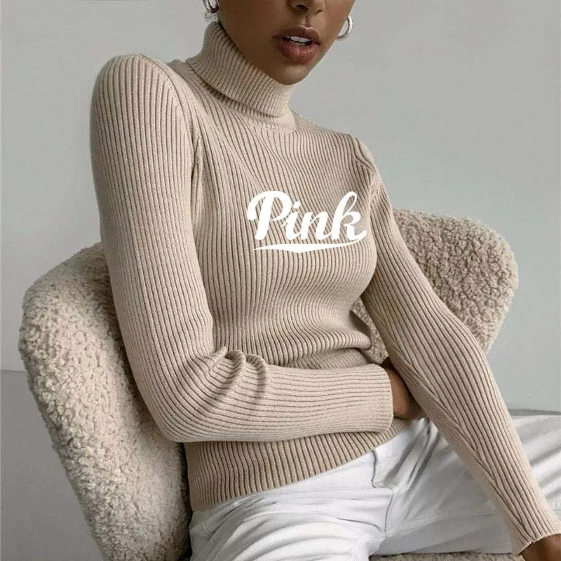 Женский вязаный пуловер с высоким воротом