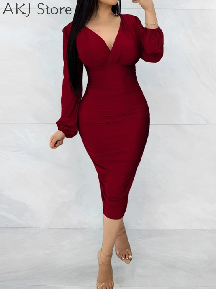 

Женское платье миди с V-образным вырезом и длинным рукавом