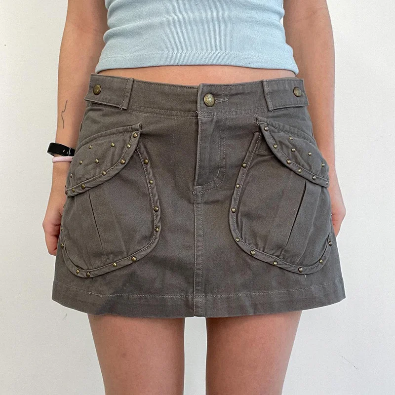 

2023 American style rivet denim skirt women's new diagonal pocket slimming A-line work dress Spicy girl low waist skirt