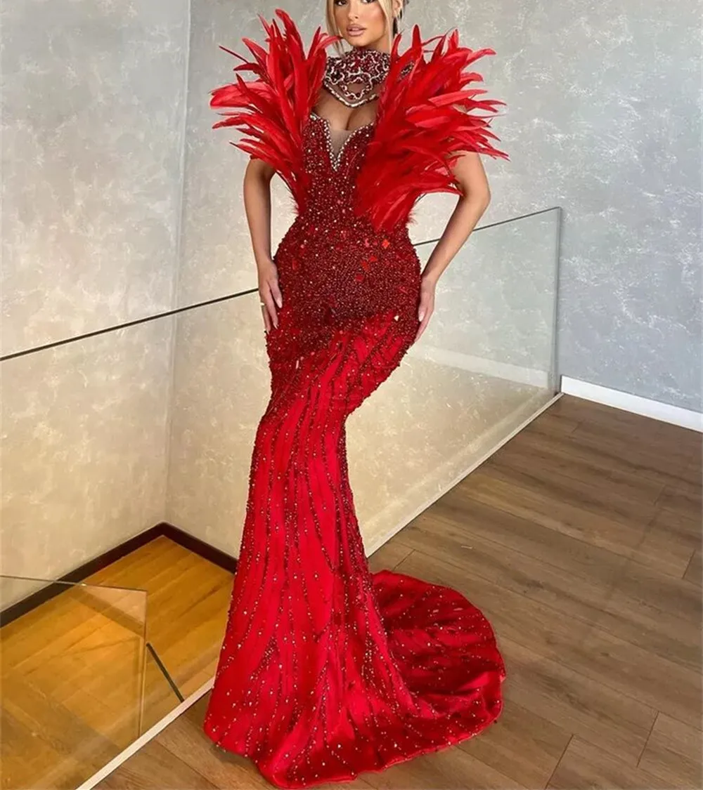 

2023 Luxury Red Beading Mermaid Celebrity Dresses Feathers Carpet Gowns Evening DressRobe De Soirée Special Occasions Custom