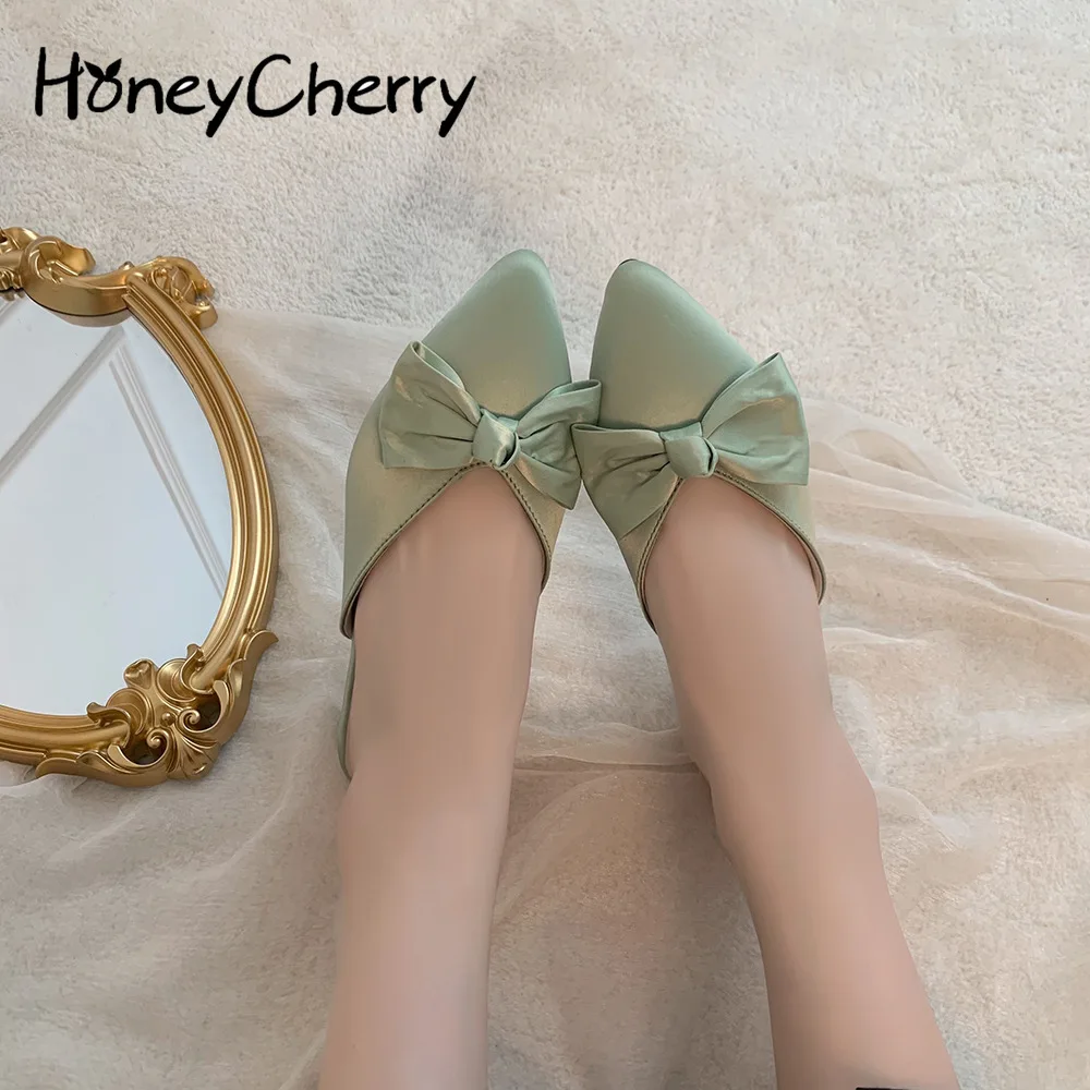 

Slippers women wear 2022 spring and summer new temperament bow fashion pointed French thick heel sandals